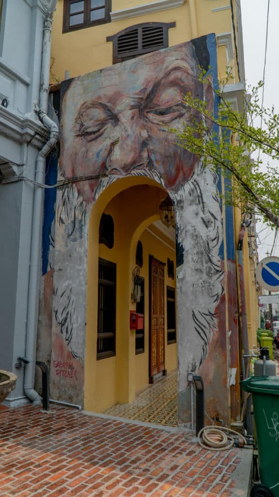 Street Art depicting a man with a beard opening his mouth