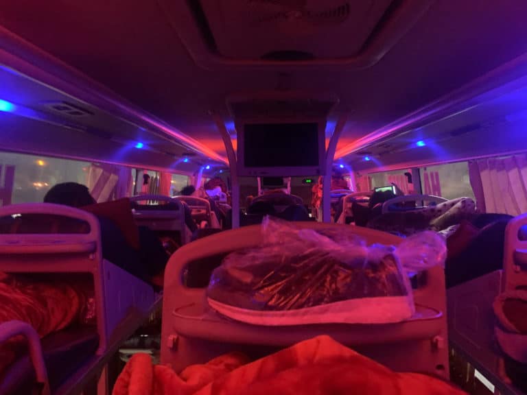 Sleeper bus interior point of view at night in Vietnam