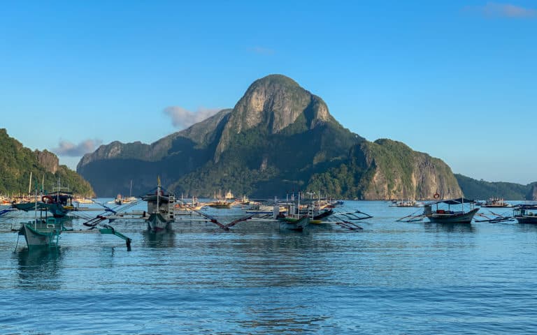 Morning view of El Nido Bay before boats leave for island hopping tours.