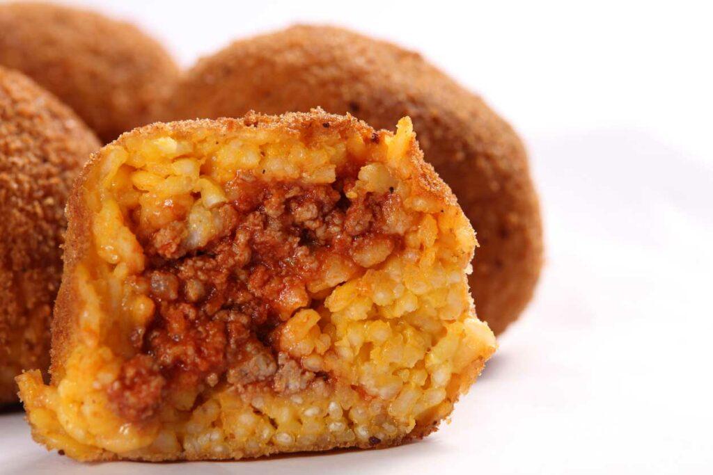 Photo of SUppli a street food in Rome with ragu, rice, cheese and beef